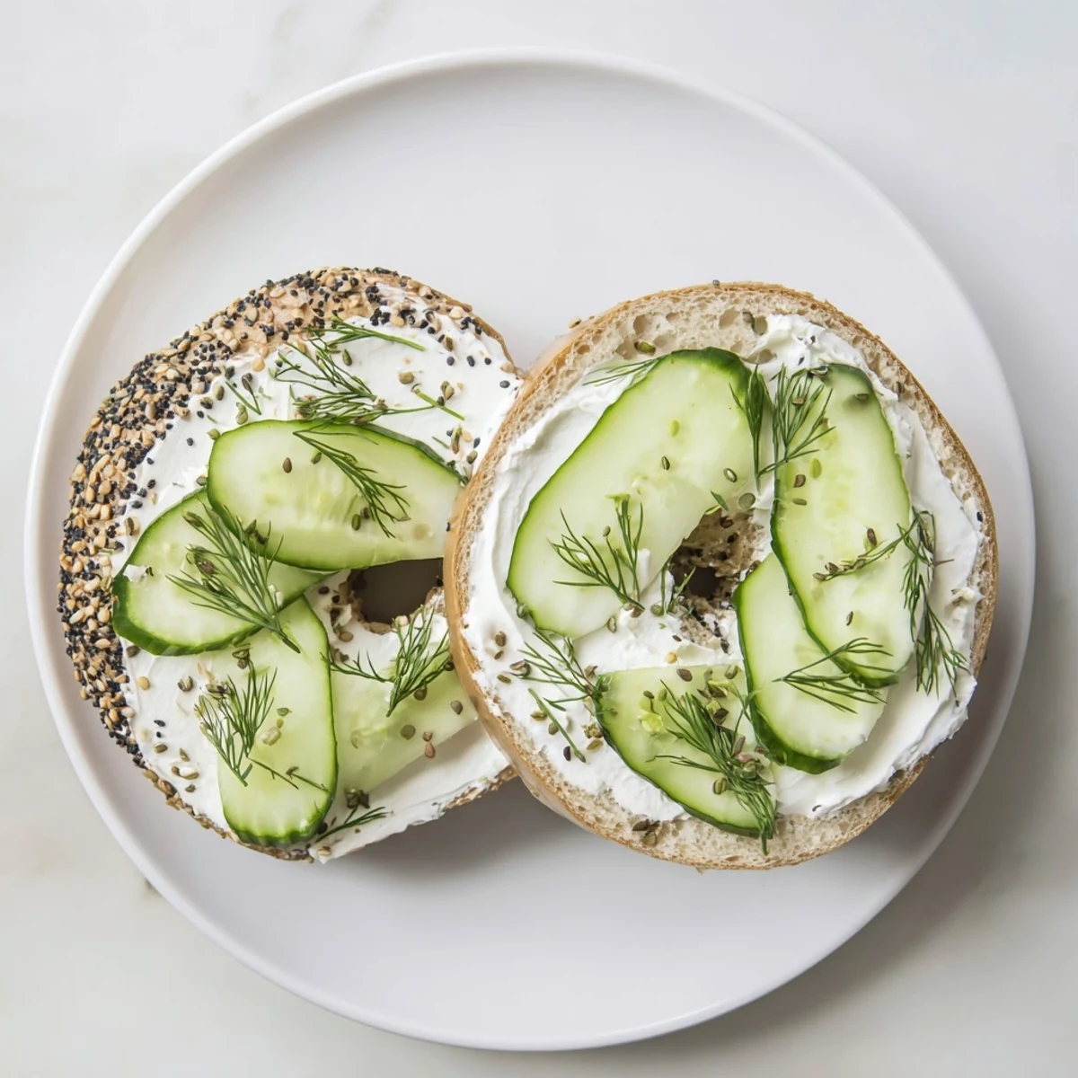 A warm bagel with cream cheese, a quintessential American breakfast staple, inviting you to take a bite.