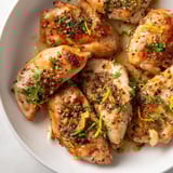 Perfectly cooked lemon pepper chicken, showing tender, golden-brown chicken ready to serve.