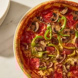 This homemade Stuffed Crust Pizza features a crispy, cheesy crust with a rich tomato sauce.