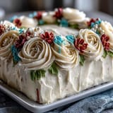 Creamy vanilla sheet cake adorned with colorful buttercream roses and fondant diploma for graduate parties.  