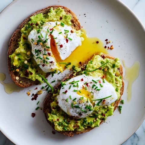 Golden, toasted bread topped with creamy smashed avocado, this simple Avocado Toast is delicious.